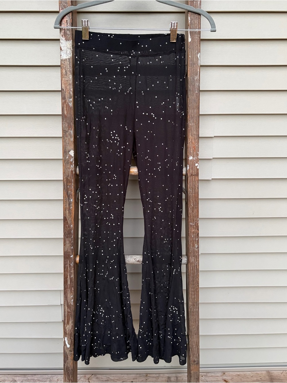 Sheer pants size small with silver dots